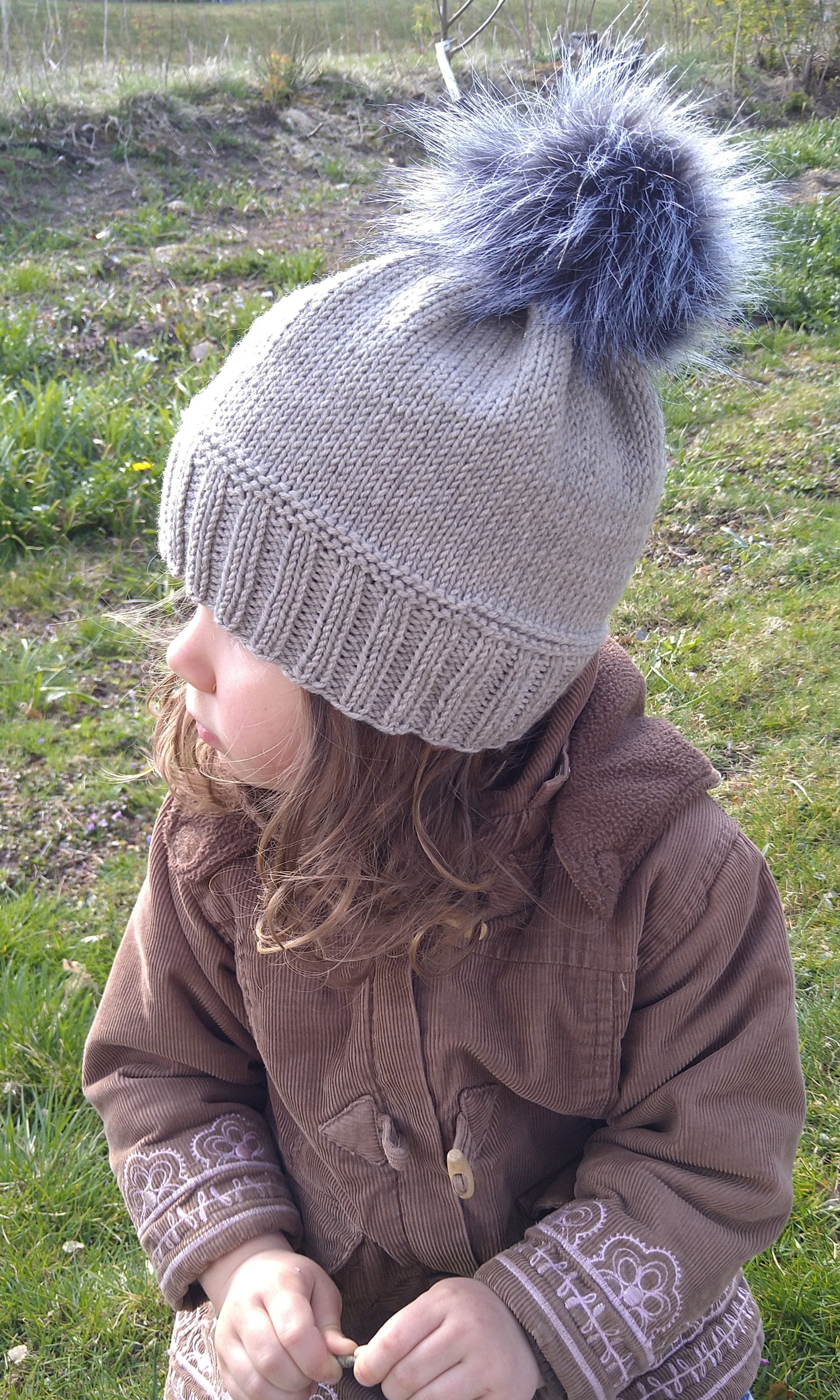 Gray Knitted Hat with Pom Pom